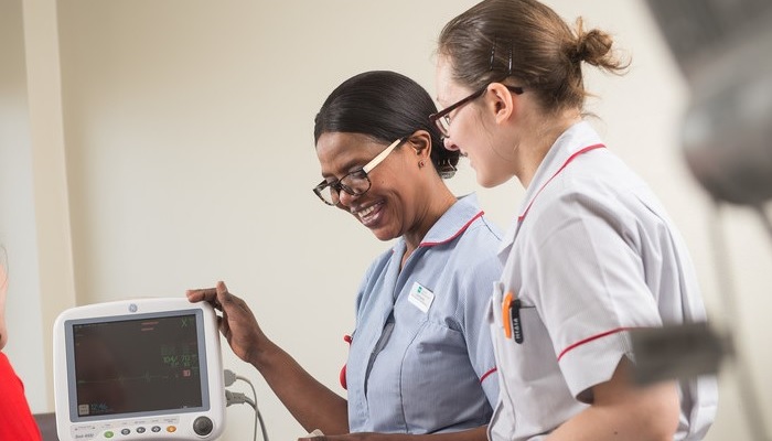 Two nurses at a monitor