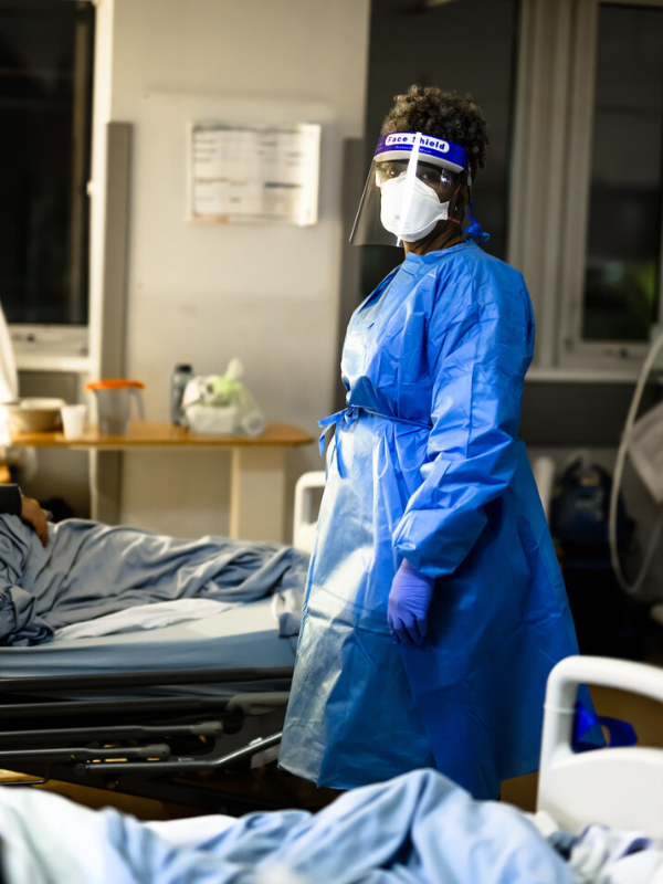 nurse on a ward in PPE