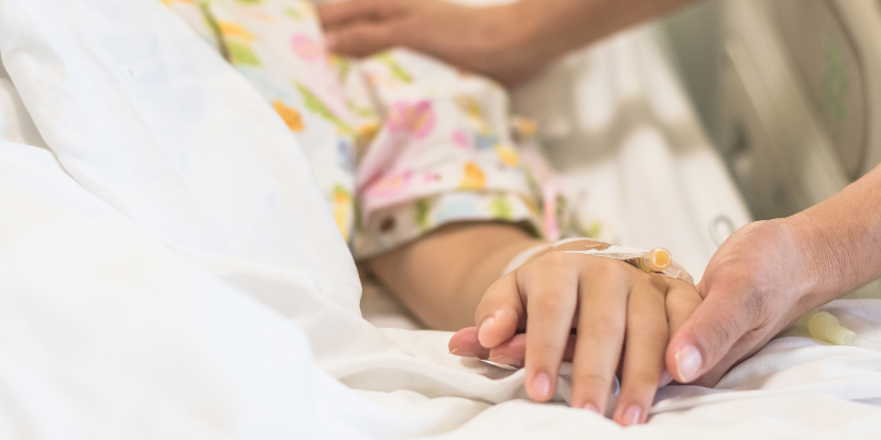 Child being monitored in hospital setting