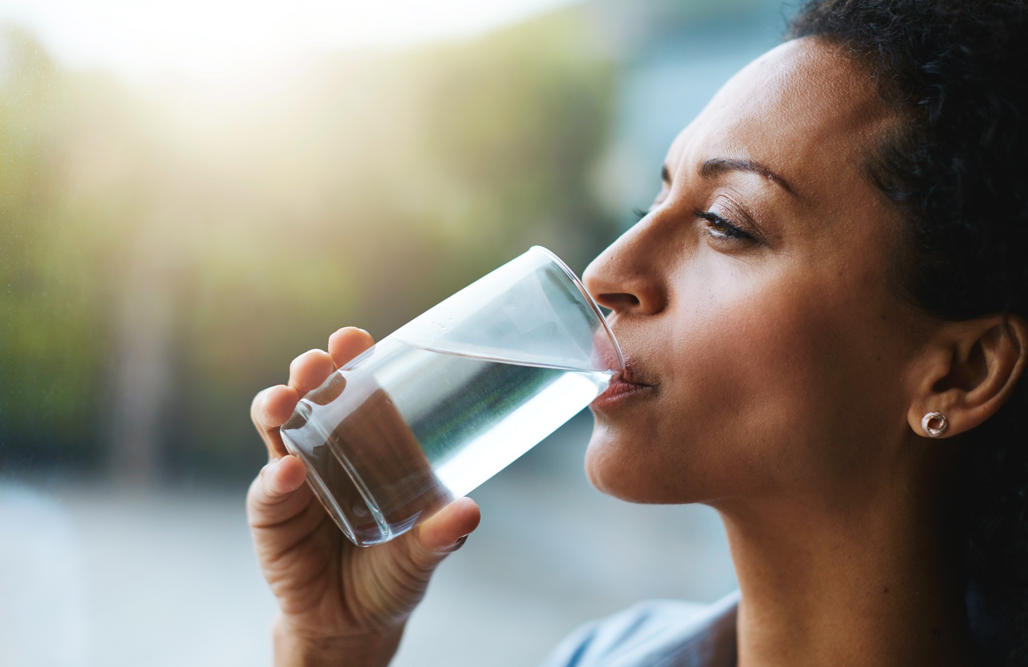 Rest, rehydrate and refuel woman drinking water