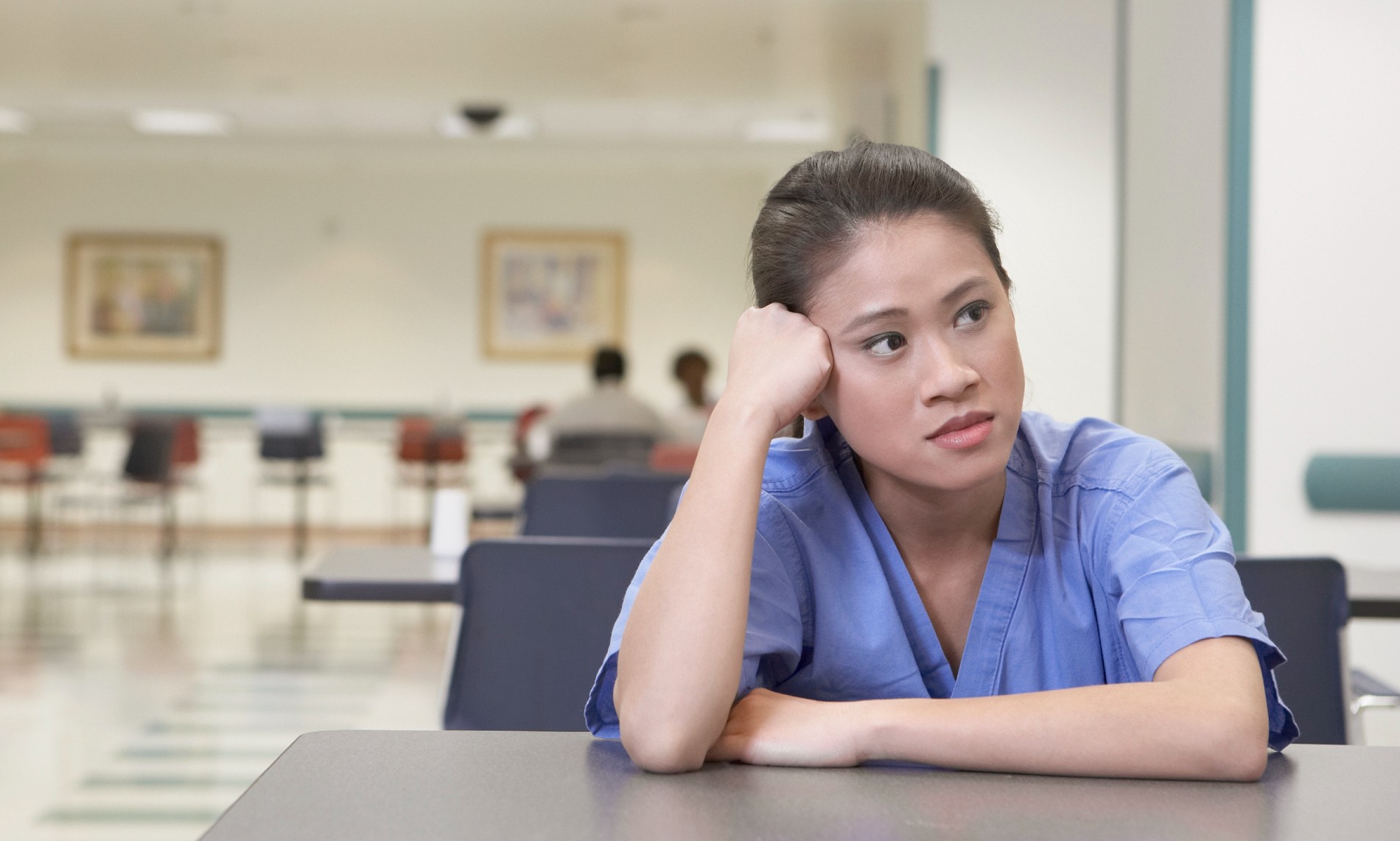 Member of nursing staff looks worried