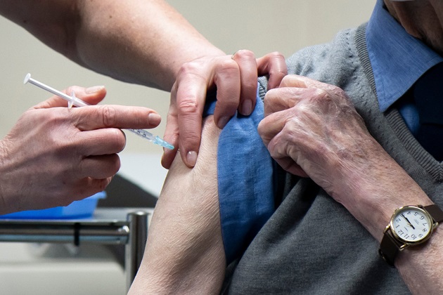 Arm held out ready for vaccination