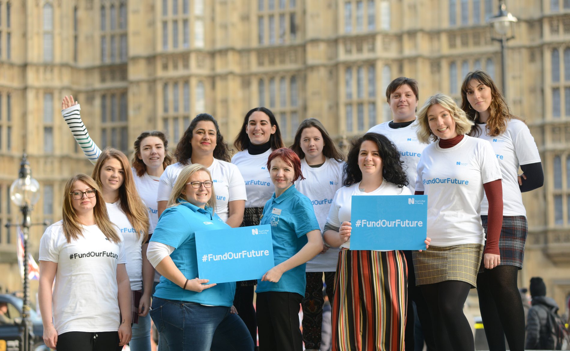 RCN student members outside parliament holding placards reading Fund Our Future