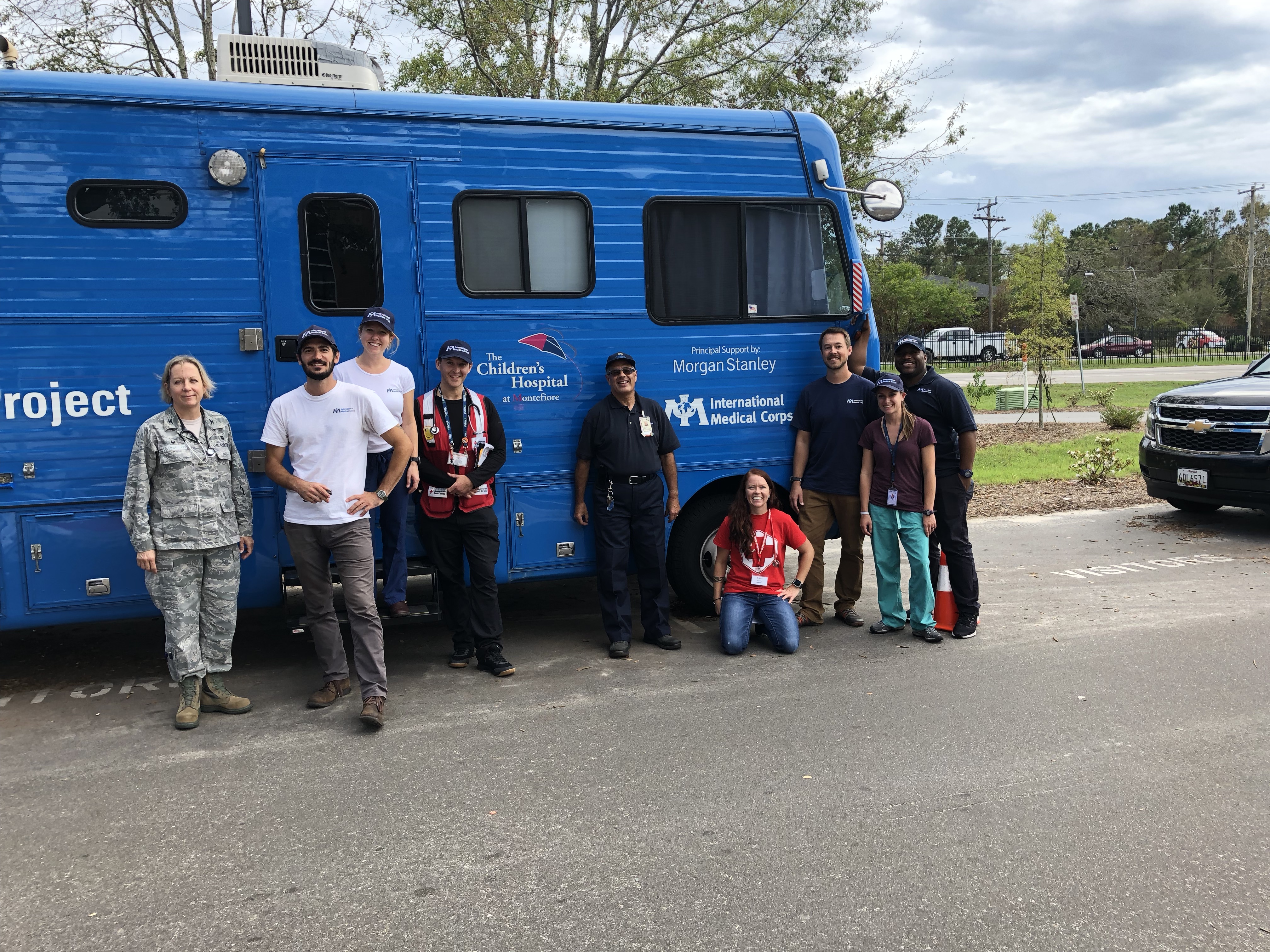 Team with hospital bus