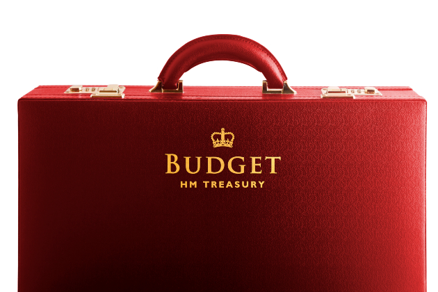 A red briefcase with the words Budget HM Treasury on it in gold lettering