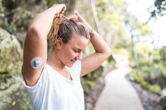 Woman-with-diabetes-tech-in-arm-630x420