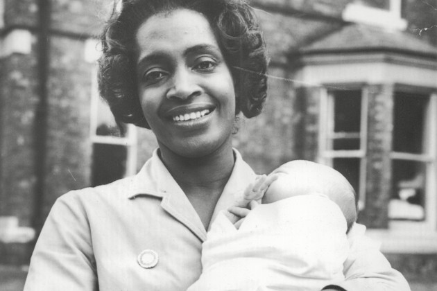 Daphne Steele with baby. Copyright: Historic England Daphne Steele caring for baby