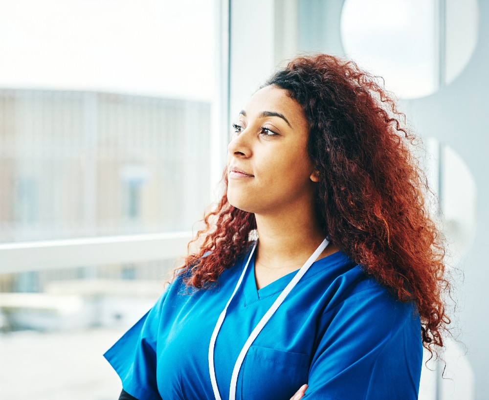 Nurse looking out of the window