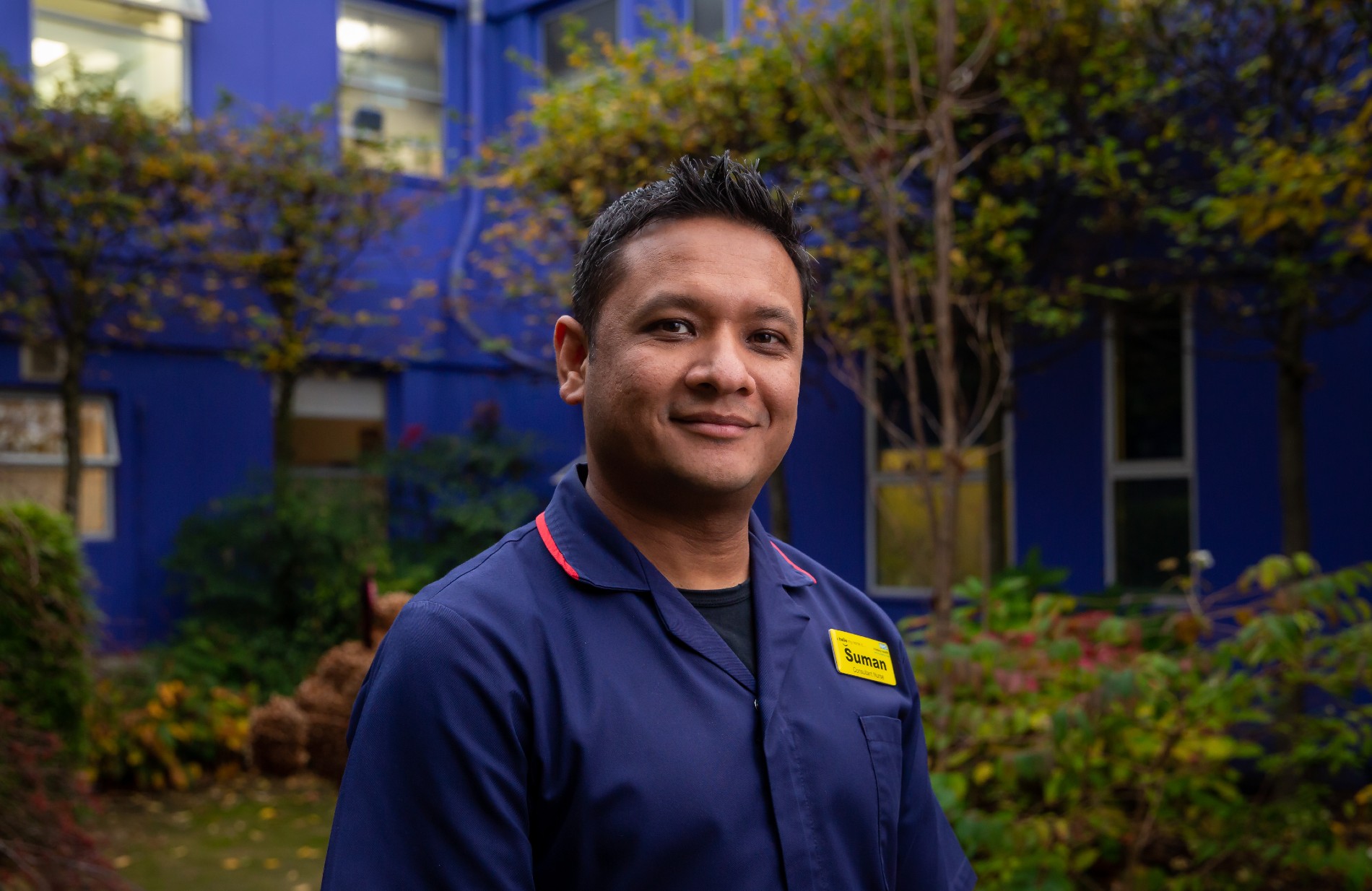 RCN Professional Lead for Critical Care Suman Shrestha stands outside Frimley Hospital 