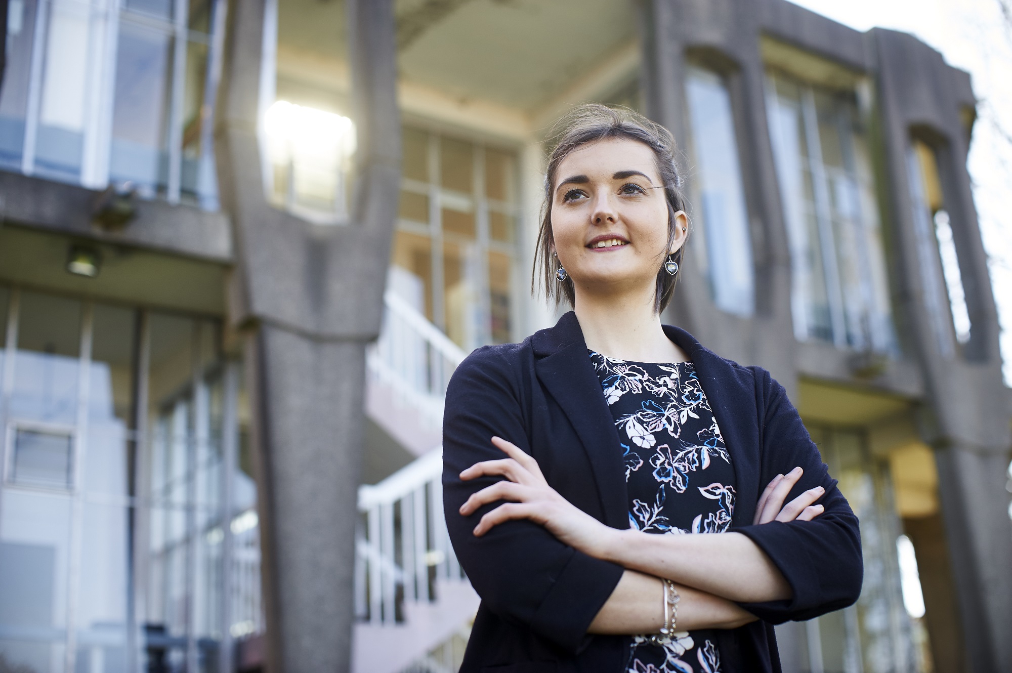 Zoe Butler standing outside a building