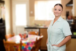 A member of nursing staff in a kitchen