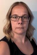 Genevieve Twining South West UK Student Committee elected member 2026 - a woman with long blonde slightly wavy hair and glasses wearing a black sleeveless top